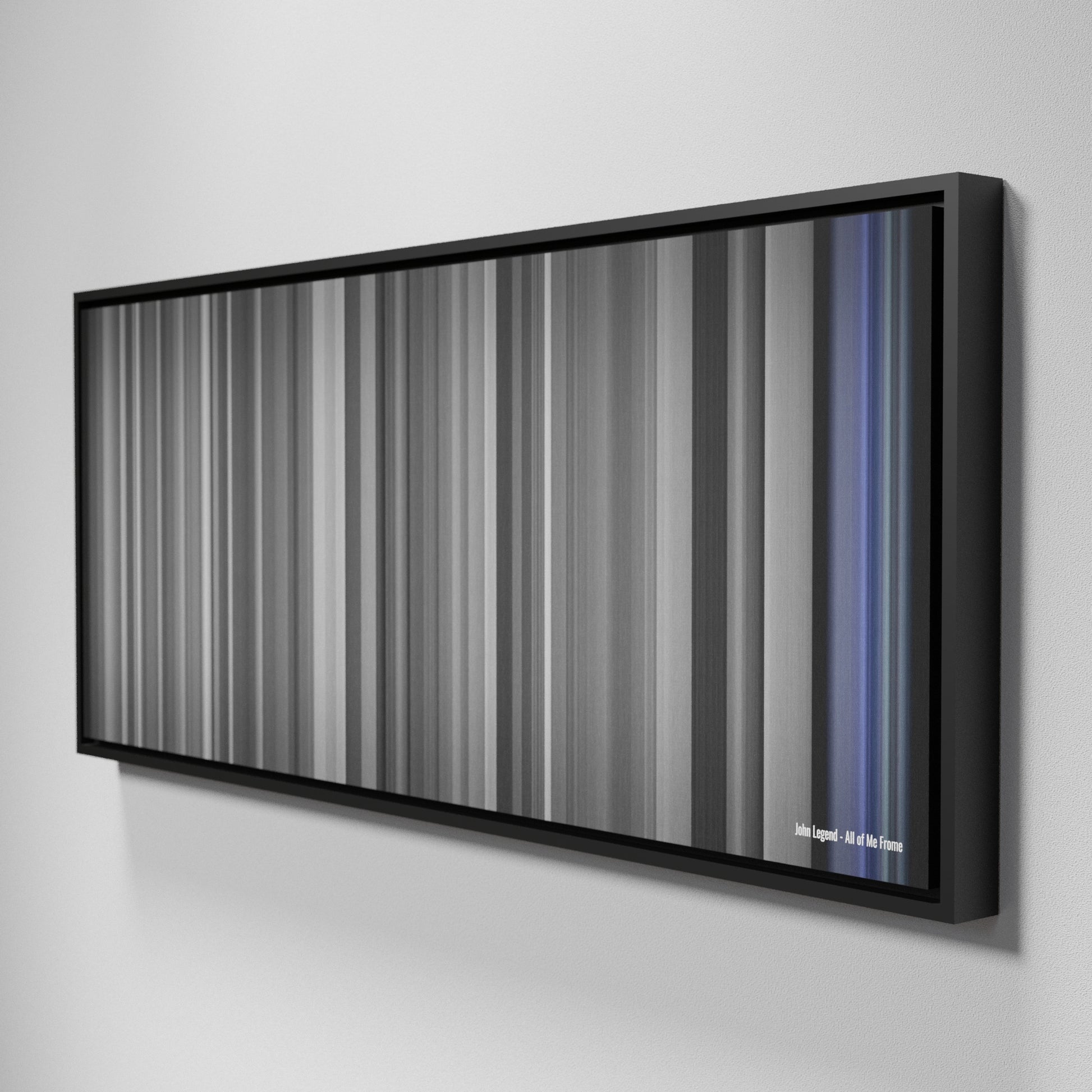 Side view of Framed Buff's of John Legend - All of Me Frome on the wall