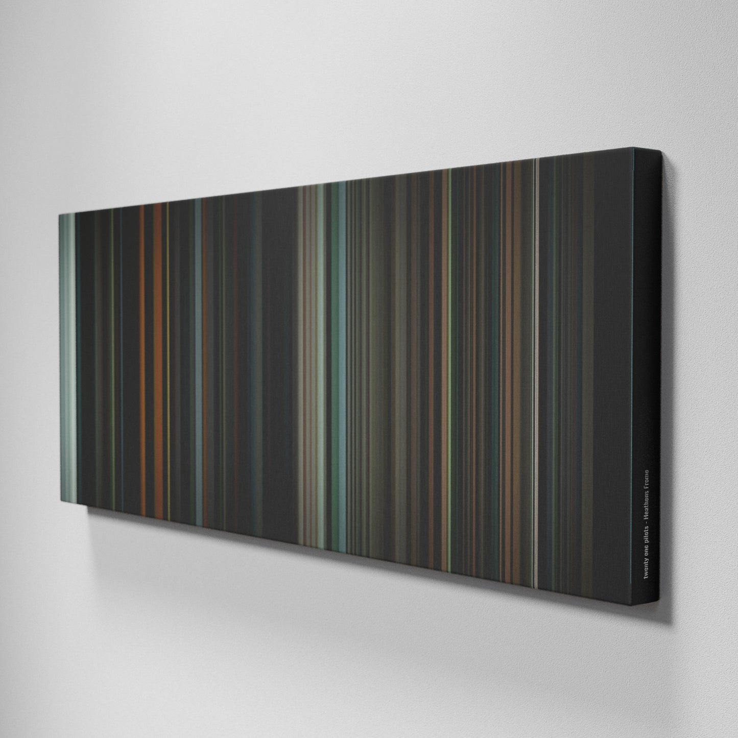 Side view of Buff's of twenty one pilots - Heathens Frome on the wall