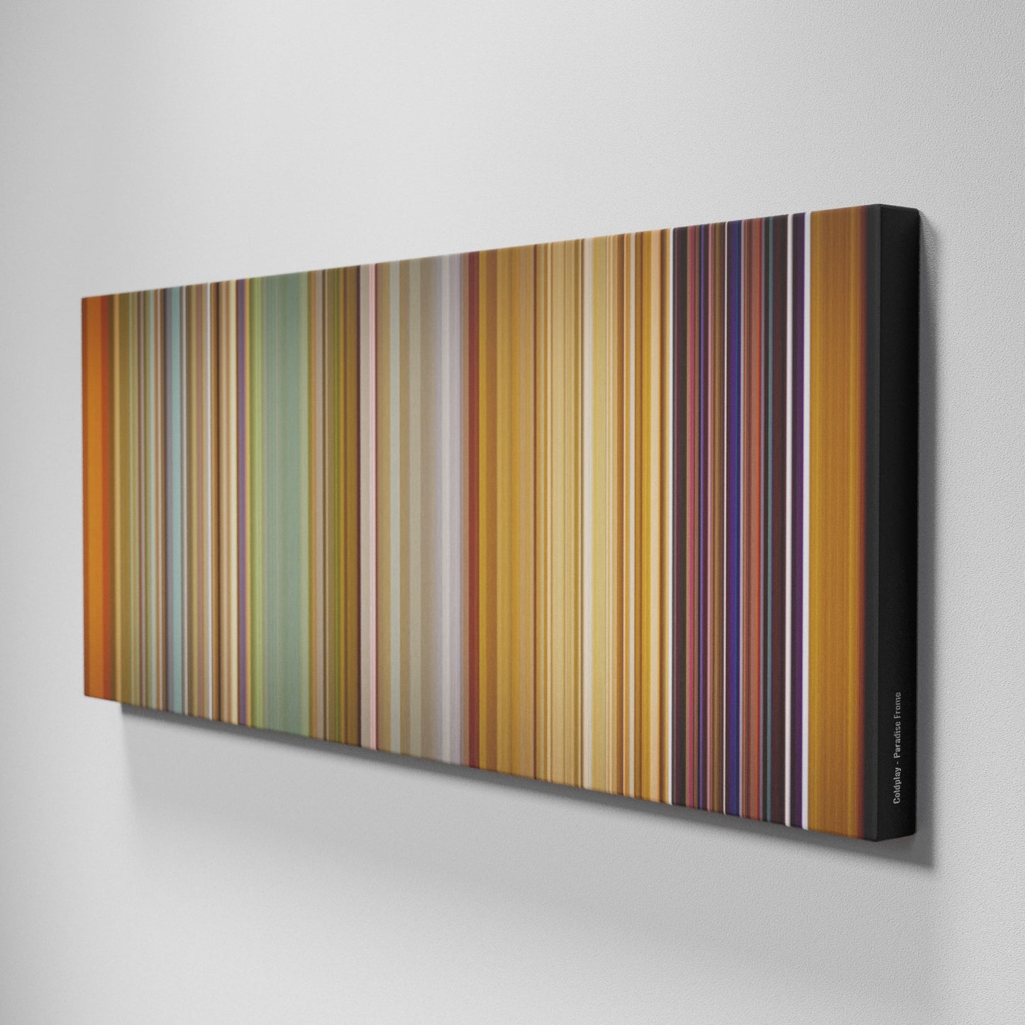 Side view of Buff's of Coldplay - Paradise Frome on the wall