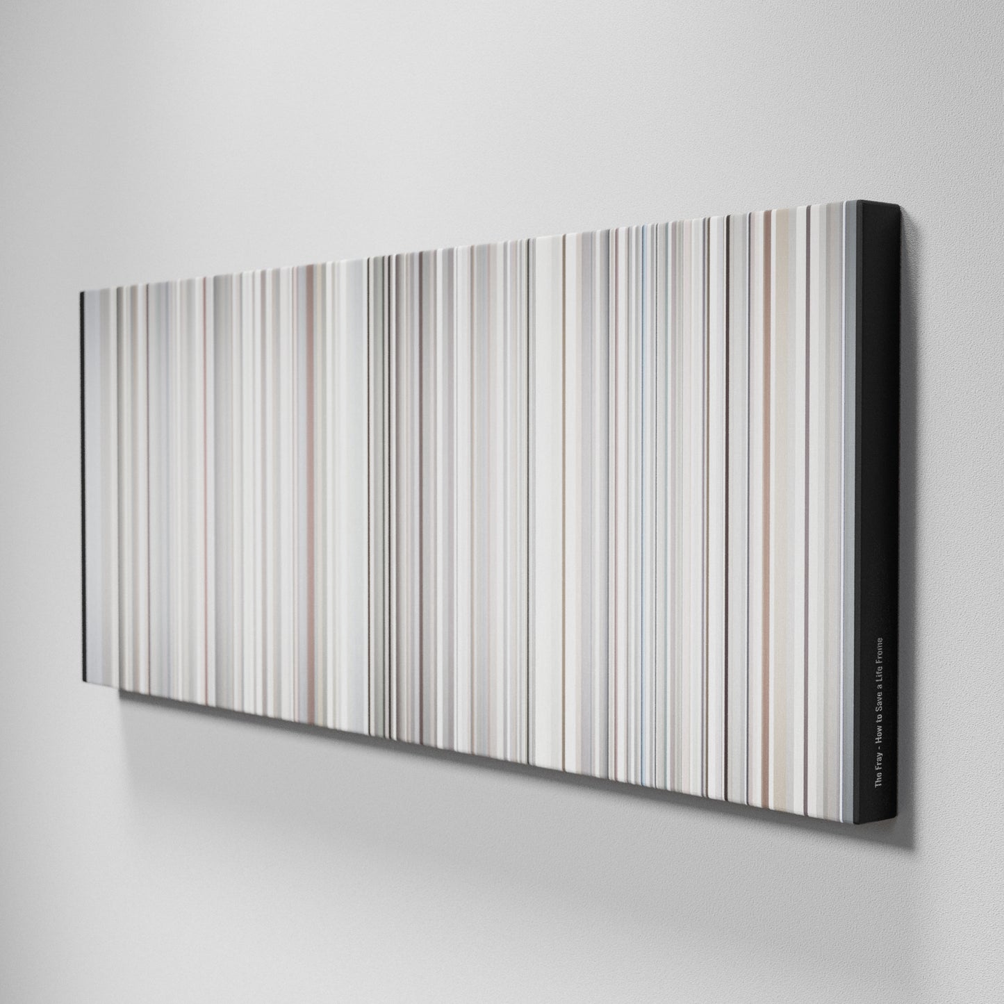 Side view of Buff's of The Fray - How to Save a Life Frome on the wall