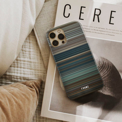 zayn - dusk till dawn Frome phone case next to interior items