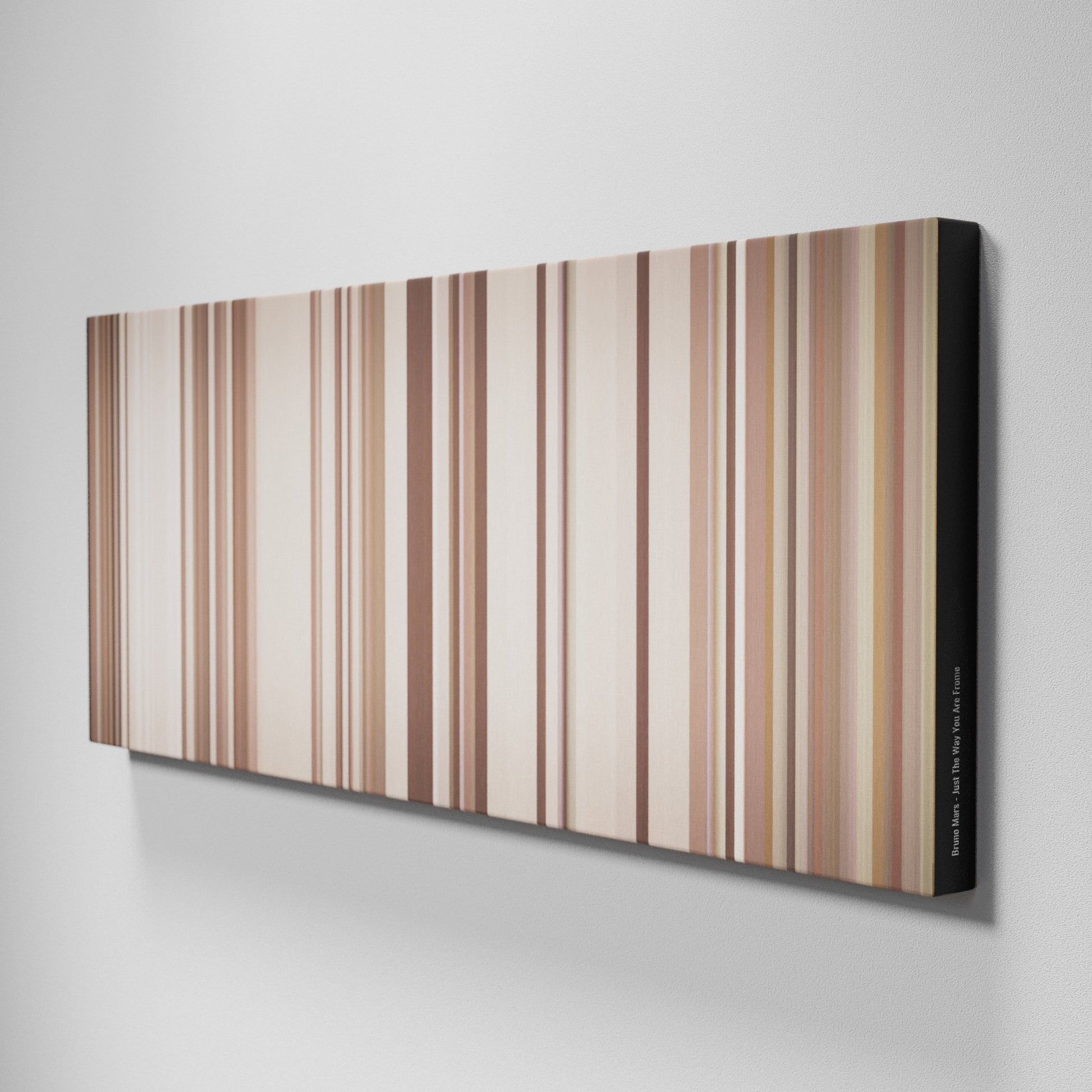 Side view of Buff's of Bruno-Mars-Just-The-Way-You-Are Frome on the wall