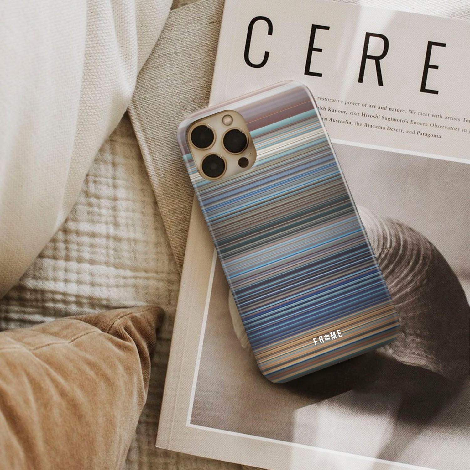 chino y nacho - andas en mi cabeza Frome phone case next to interior items