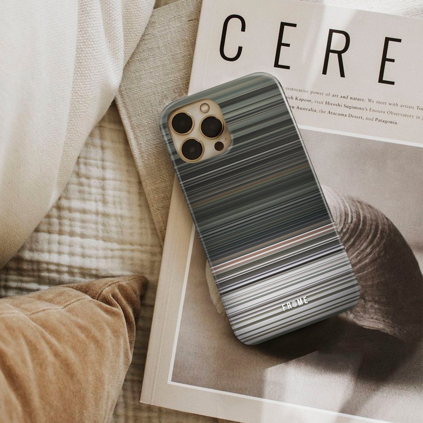 eminem - not afraid Frome phone case next to interior items