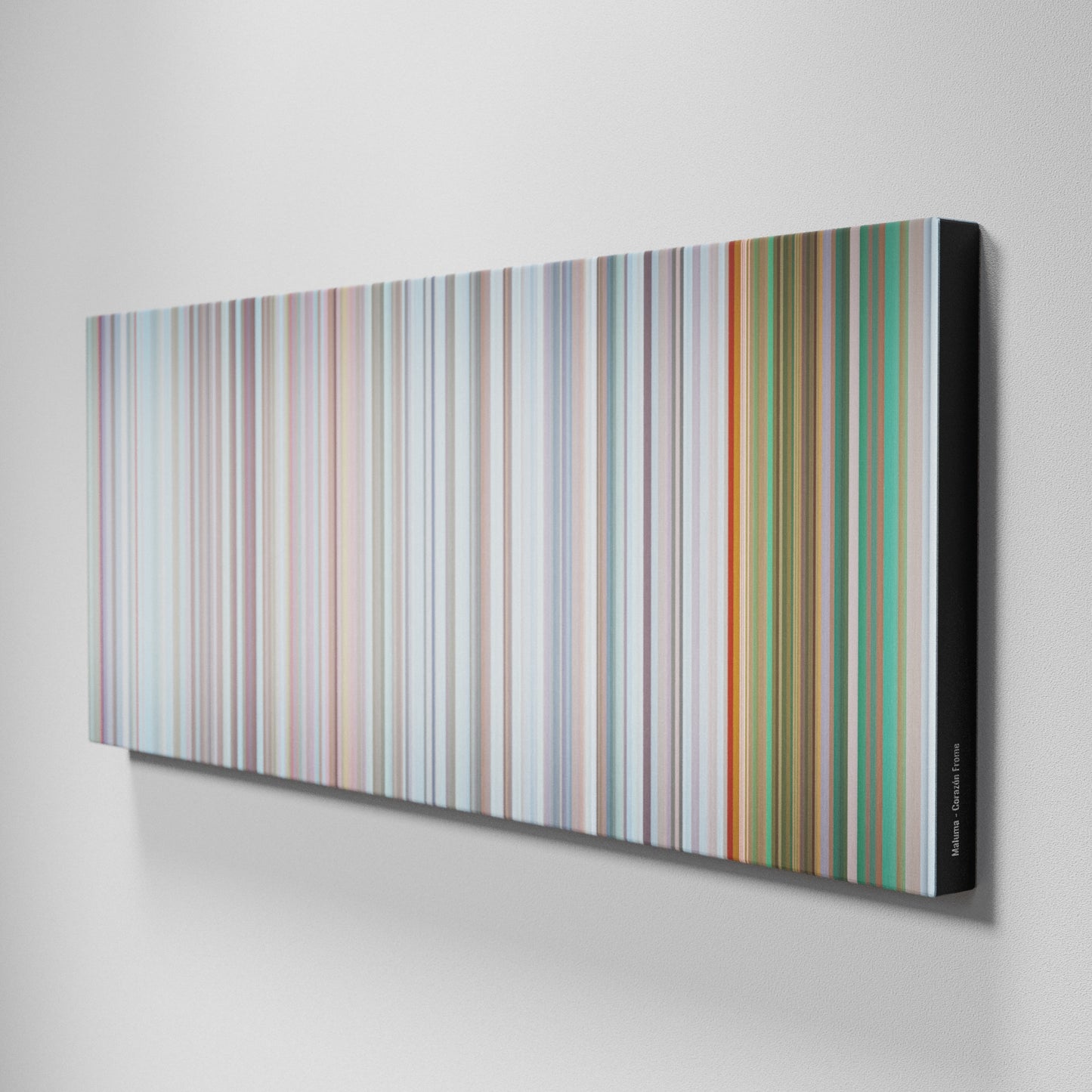 Side view of Buff's of Maluma-Corazon Frome on the wall