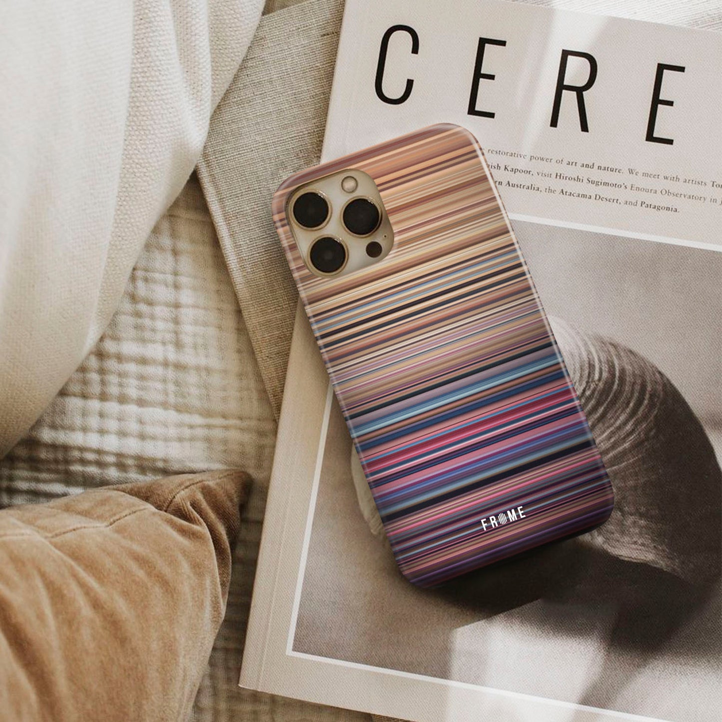 ellie goulding - burn Frome phone case next to interior items