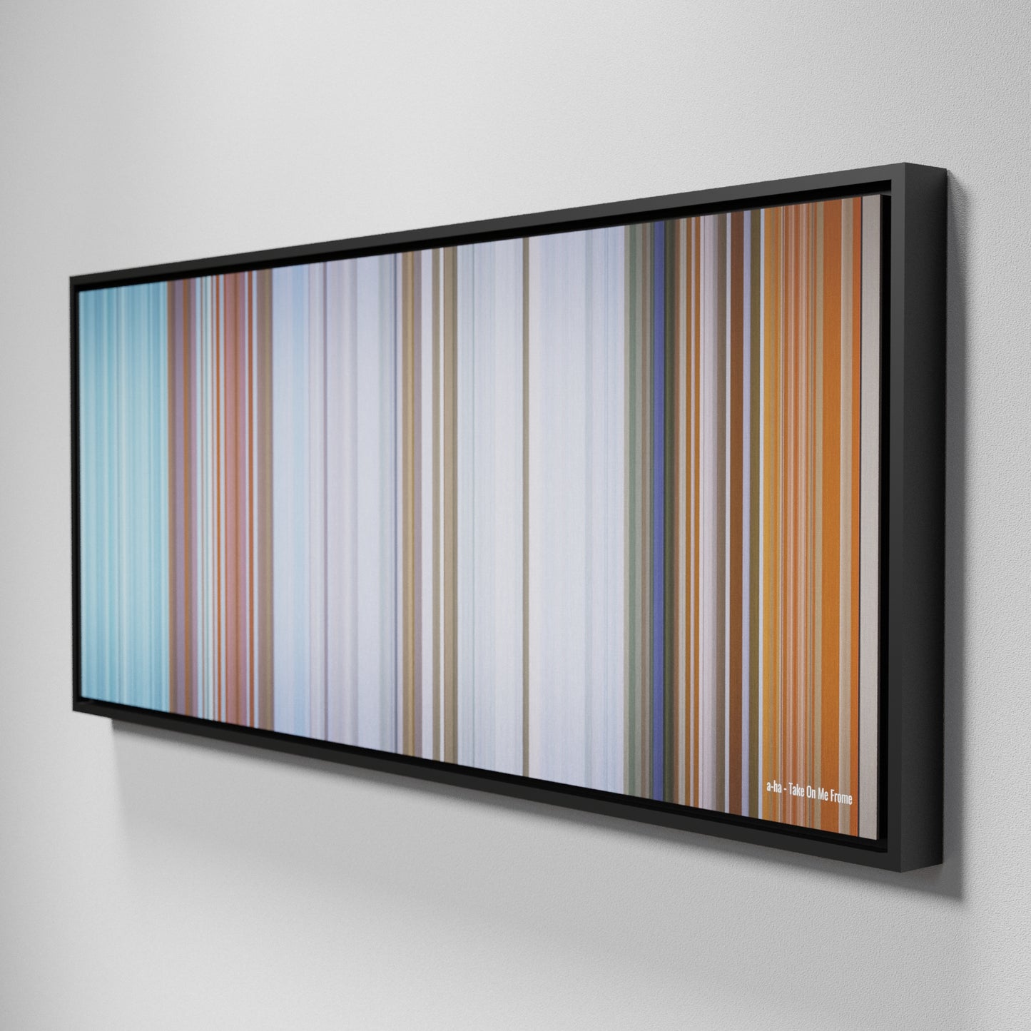 Side view of Framed Buff's of a-ha-Take-On-Me Frome on the wall