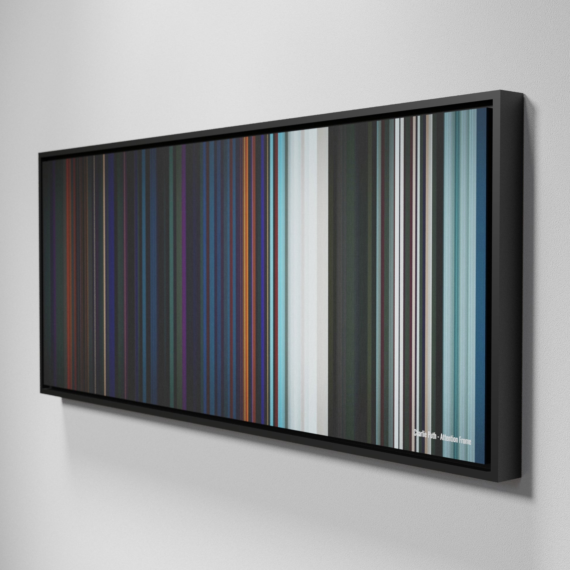 Side view of Framed Buff's of Charlie-Puth-Attention Frome on the wall