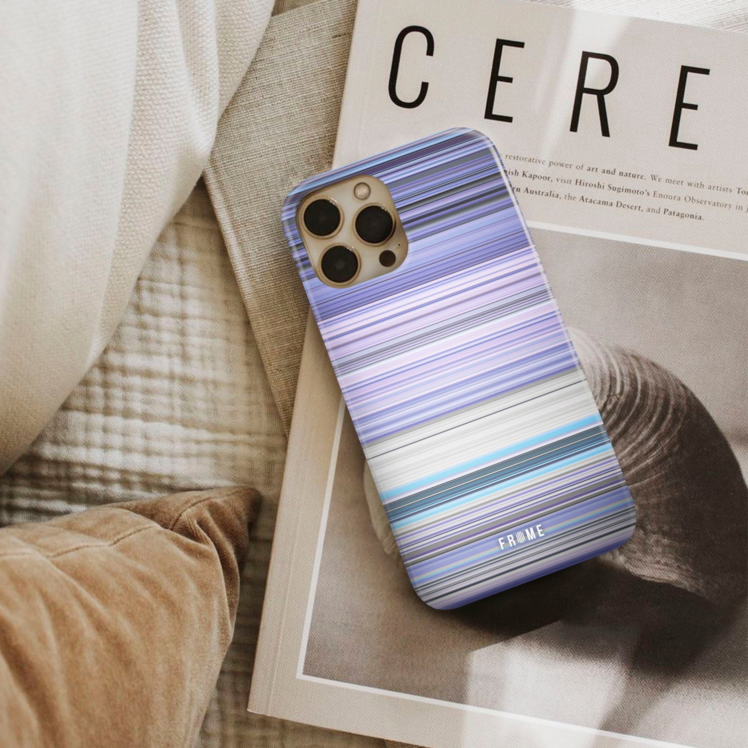 ariana grande - focus Frome phone case next to interior items