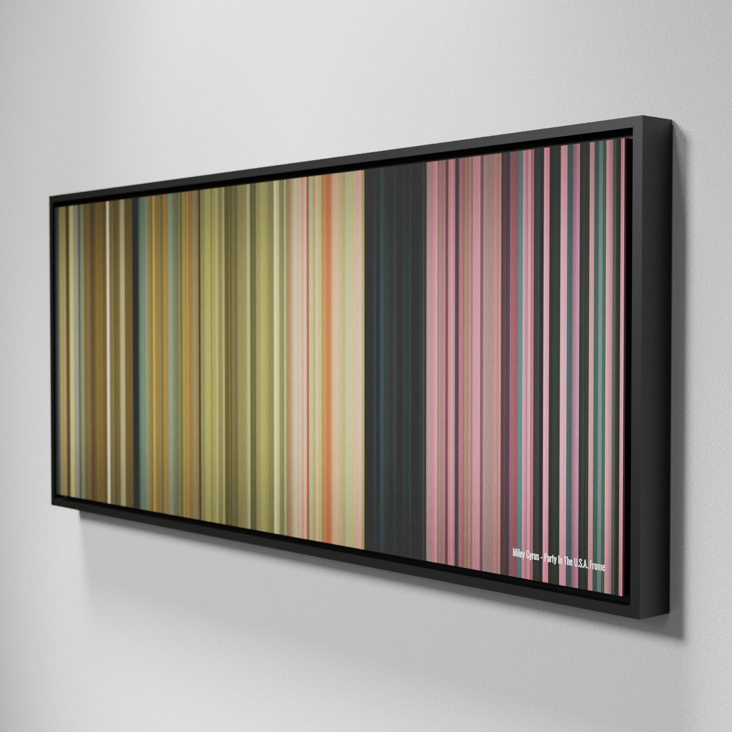 Side view of Framed Buff's of Miley-Cyrus-Party-In-The-USA Frome on the wall