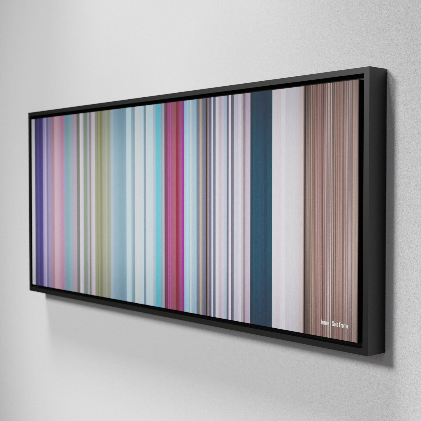 Side view of Framed Buff's of Jennie-Solo Frome on the wall