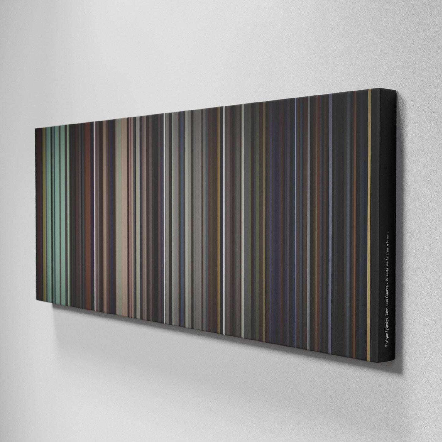 Side view of Buff's of Enrique-Iglesias-Juan-Luis-Guerra-Cuando-Me-Enamoro Frome on the wall