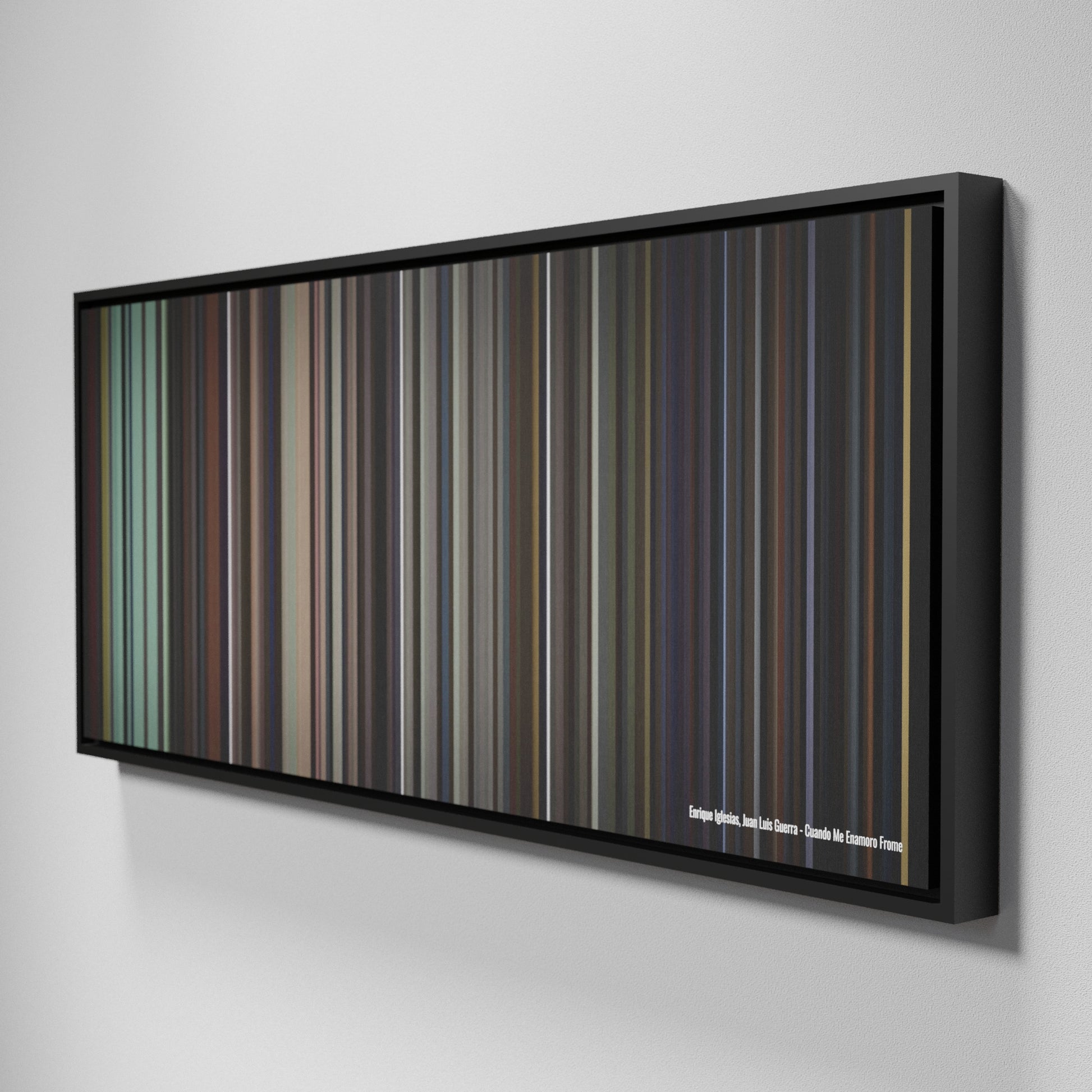 Side view of Framed Buff's of Enrique-Iglesias-Juan-Luis-Guerra-Cuando-Me-Enamoro Frome on the wall