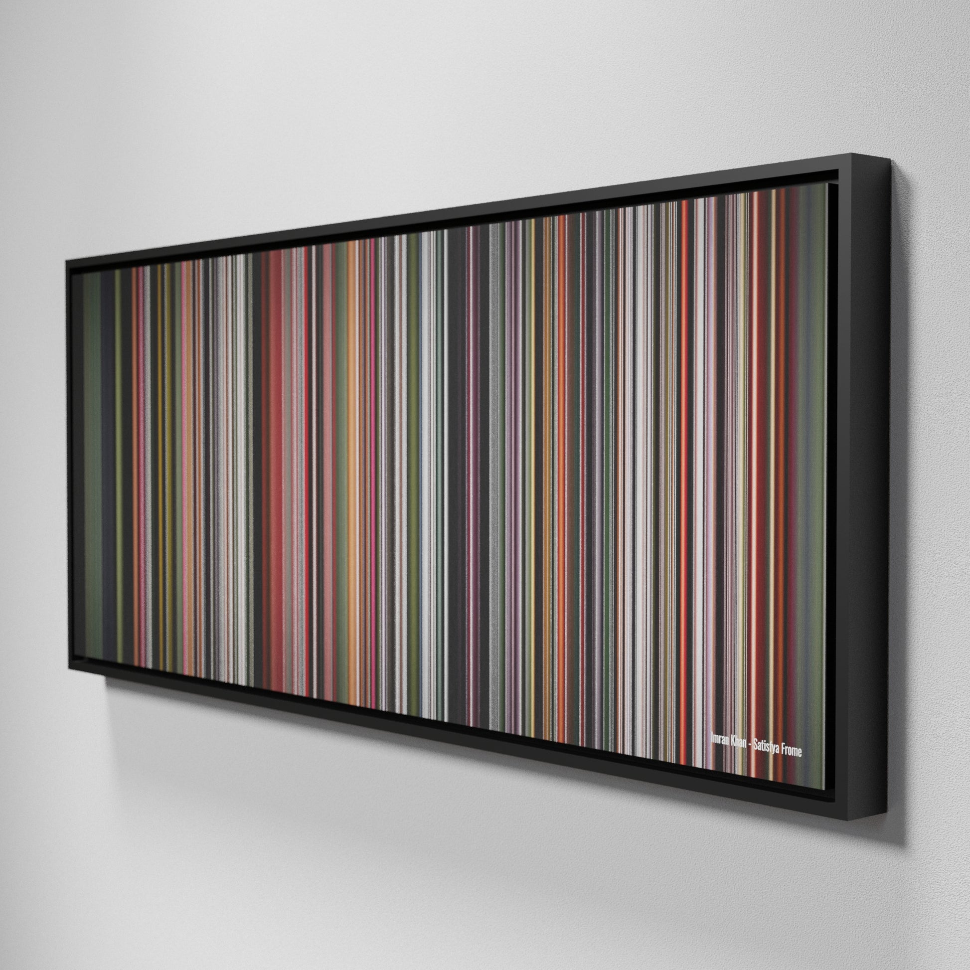 Side view of Framed Buff's of Imran-Khan-Satisfya Frome on the wall