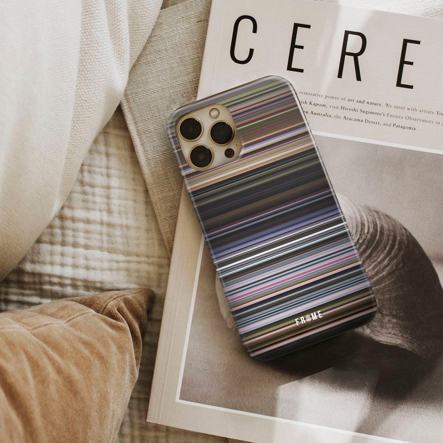 adele - set fire to the rain Frome phone case next to interior items