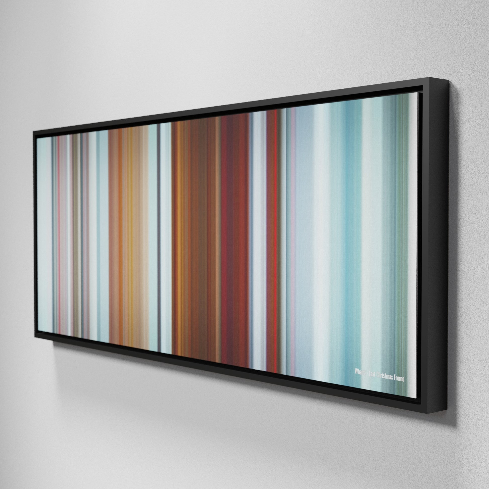 Side view of Framed Buff's of Wham-Last-Christmas Frome on the wall